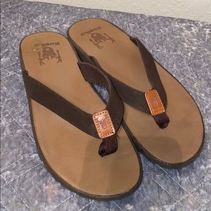 Dark brown flip flops